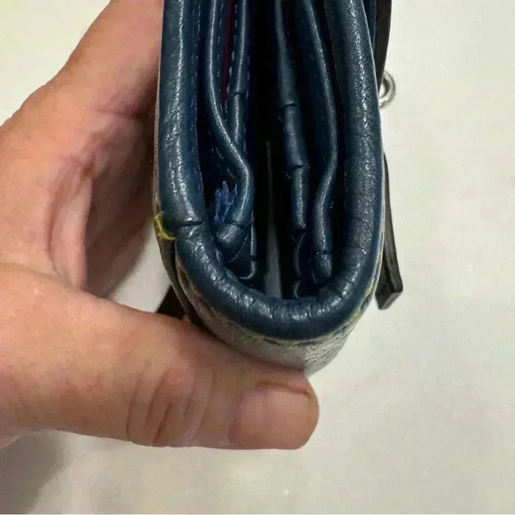 Navy blue pebble leather trifold wallet. Red interior. Perfect condition - Picture 5 of 10